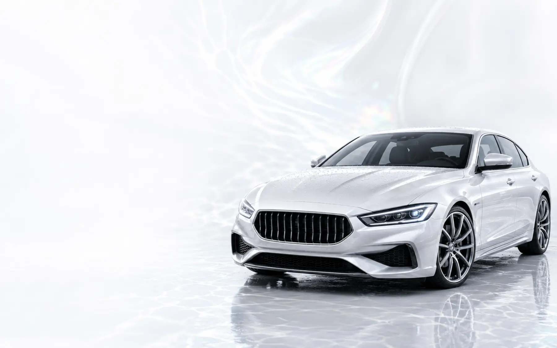 Pearl white performance sedan with a freshly detailed finish